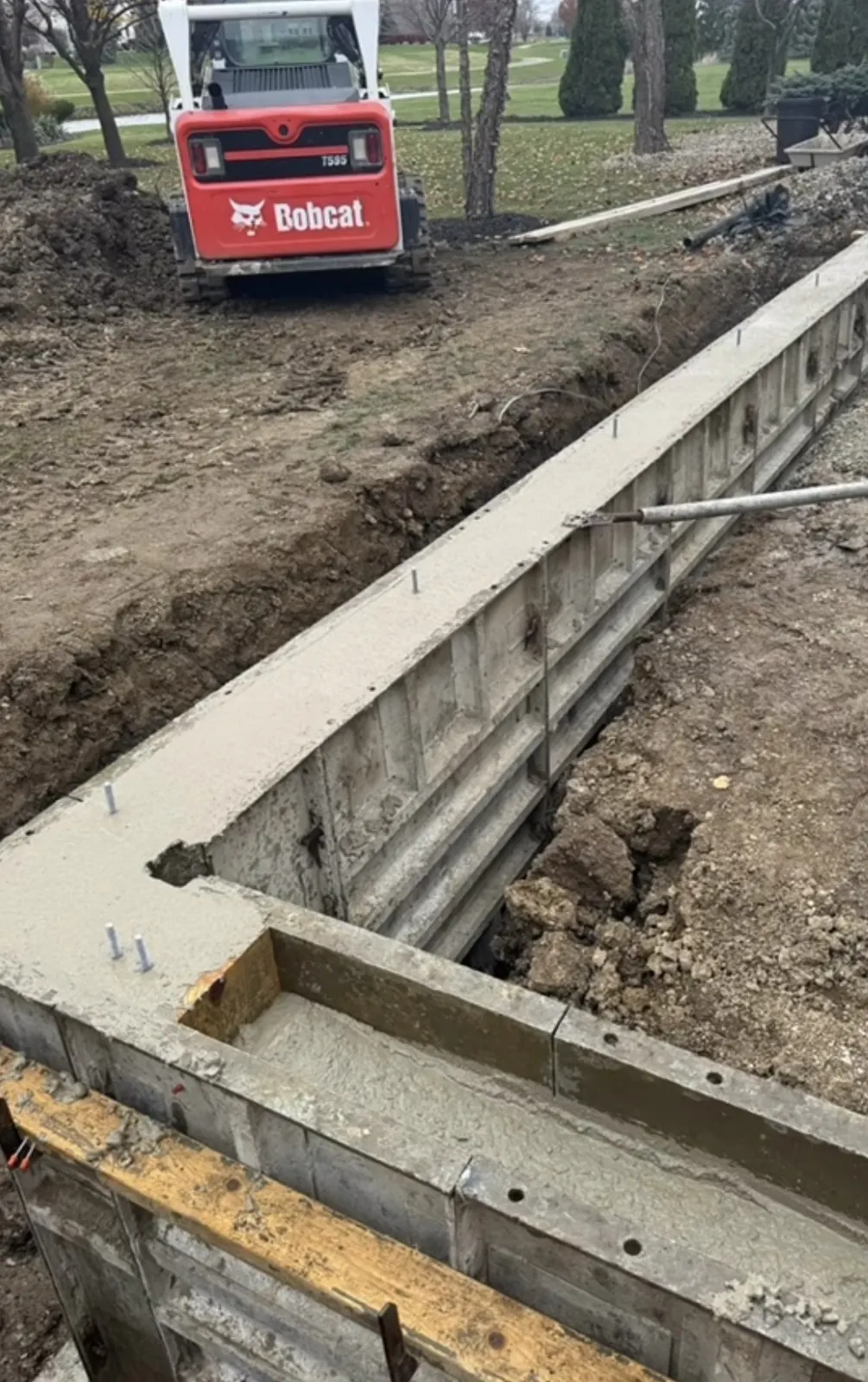 Excavation and concrete footing preparation