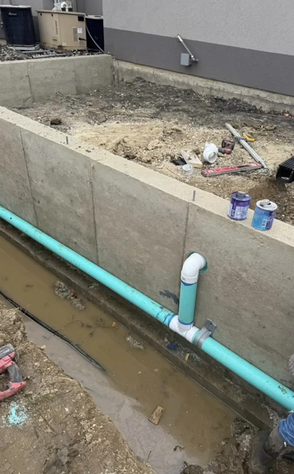 Concrete foundation wall with utility preparation