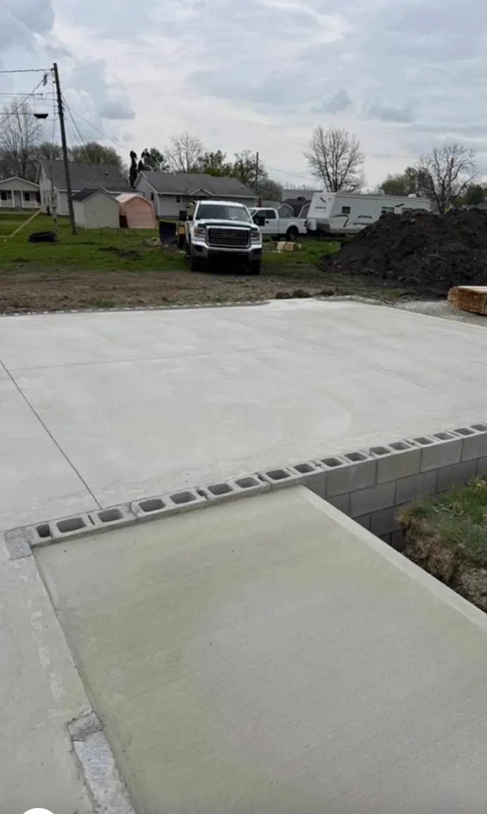 New concrete driveway sections with drainage channel
